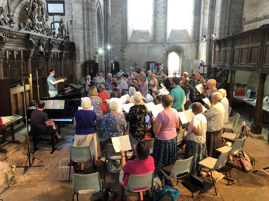 Assistant conductor, Thomas Mottershead, conducting the choir
